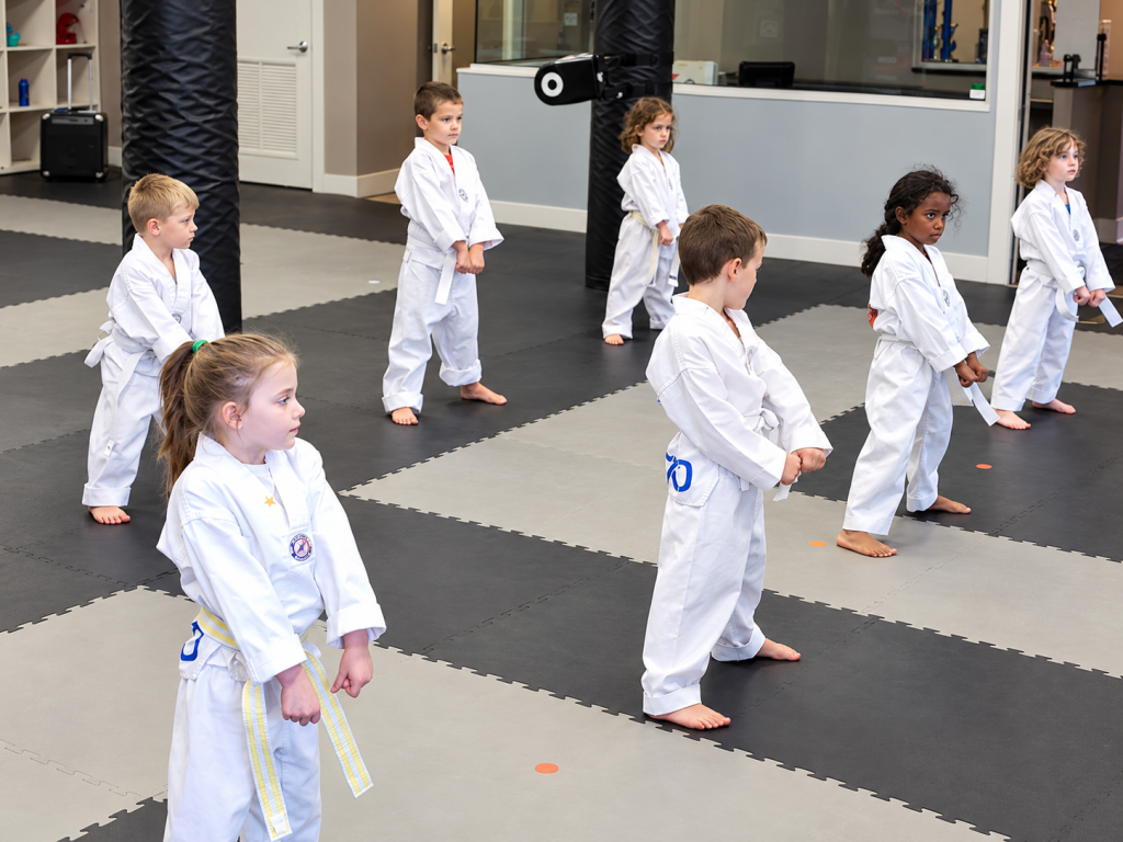 Tiger Tots students practicing ready stances together at DK Fitness Arts.